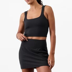 Black Athleta salutation stash 14.5” skort size small